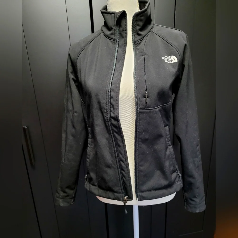 The North Face black zip up jacket